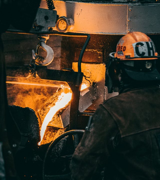 vertical-shot-adult-industrial-worker-uniforms-melting-metal-factory-min vertical-shot-adult-industrial-worker-uniforms-melting-metal-factory-min